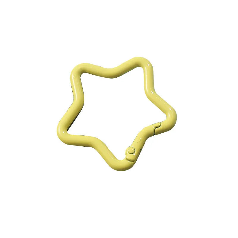 Zinc alloy five-pointed star keychain in light pink, one of ten available macaron colours.