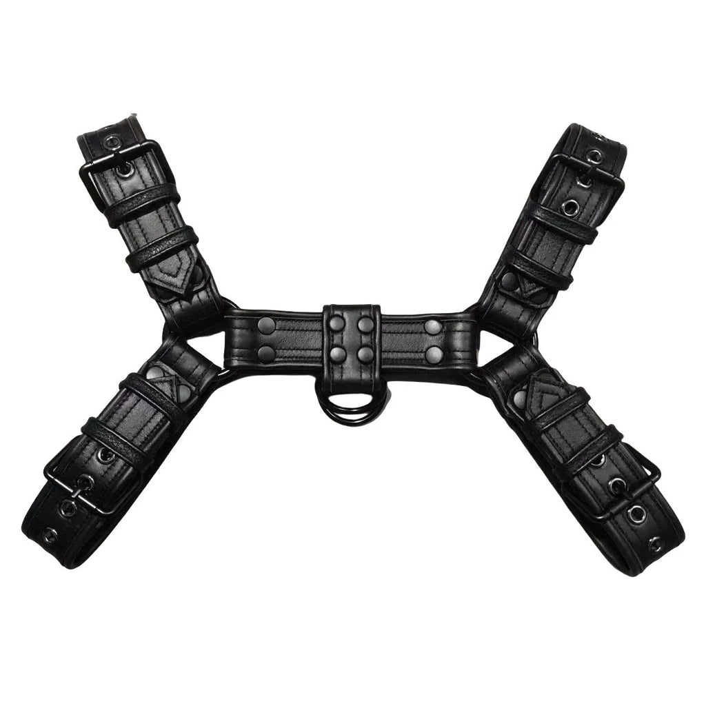 Black leather chest muscle bondage strap with silver metal buckles and rivets laid flat.