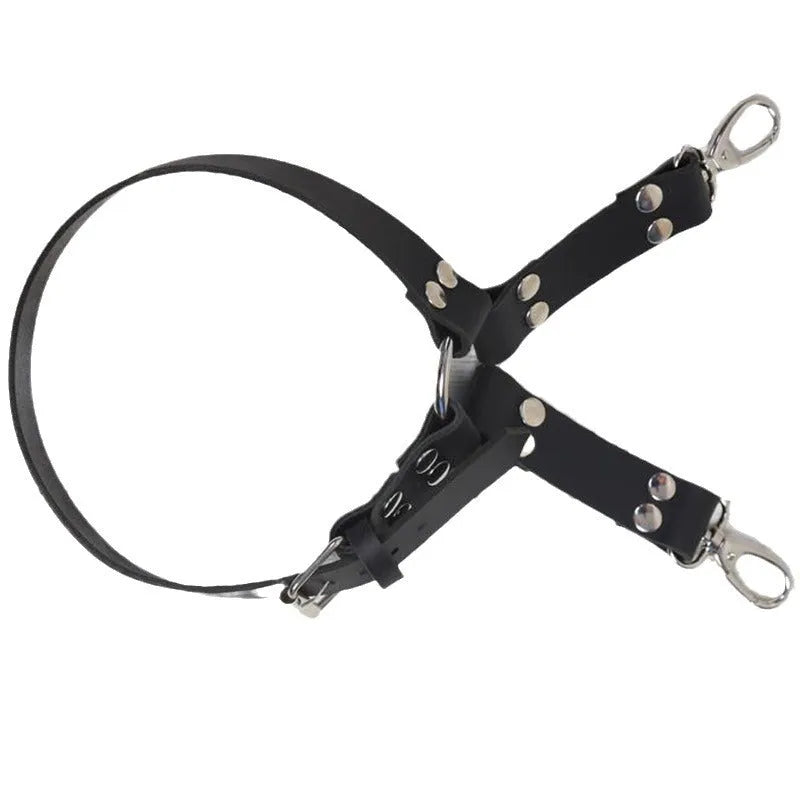 Black PU leather leggings with leather accessories attached to the legs