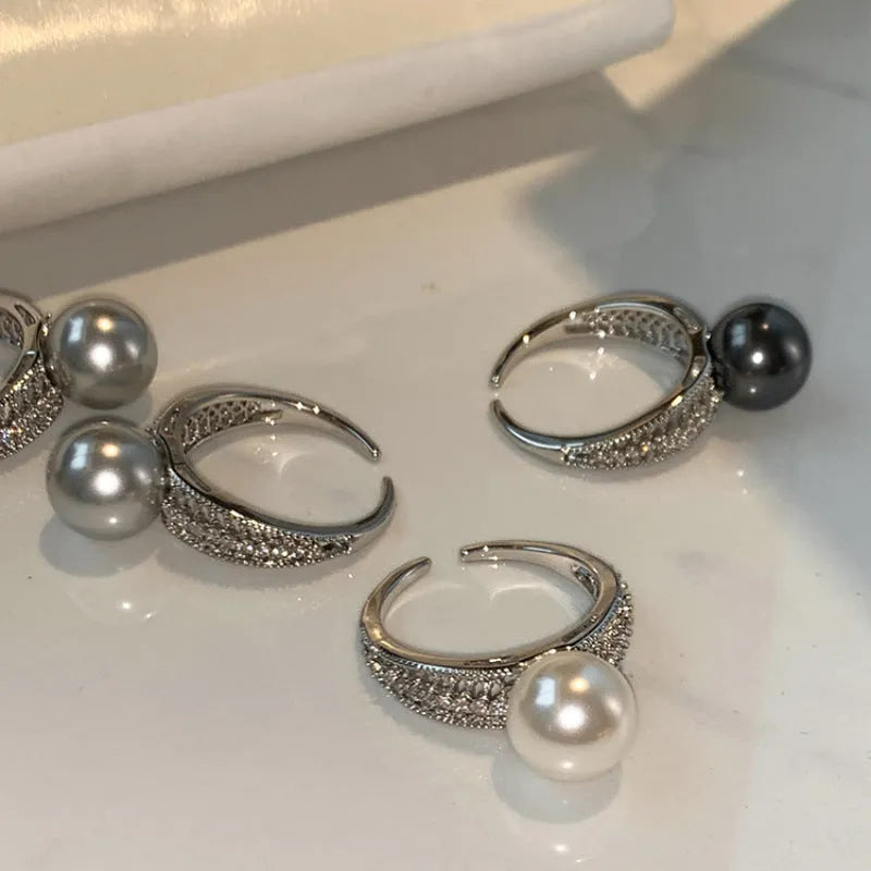 Adjustable opening geometric copper ring for women in black pearl or silver colour