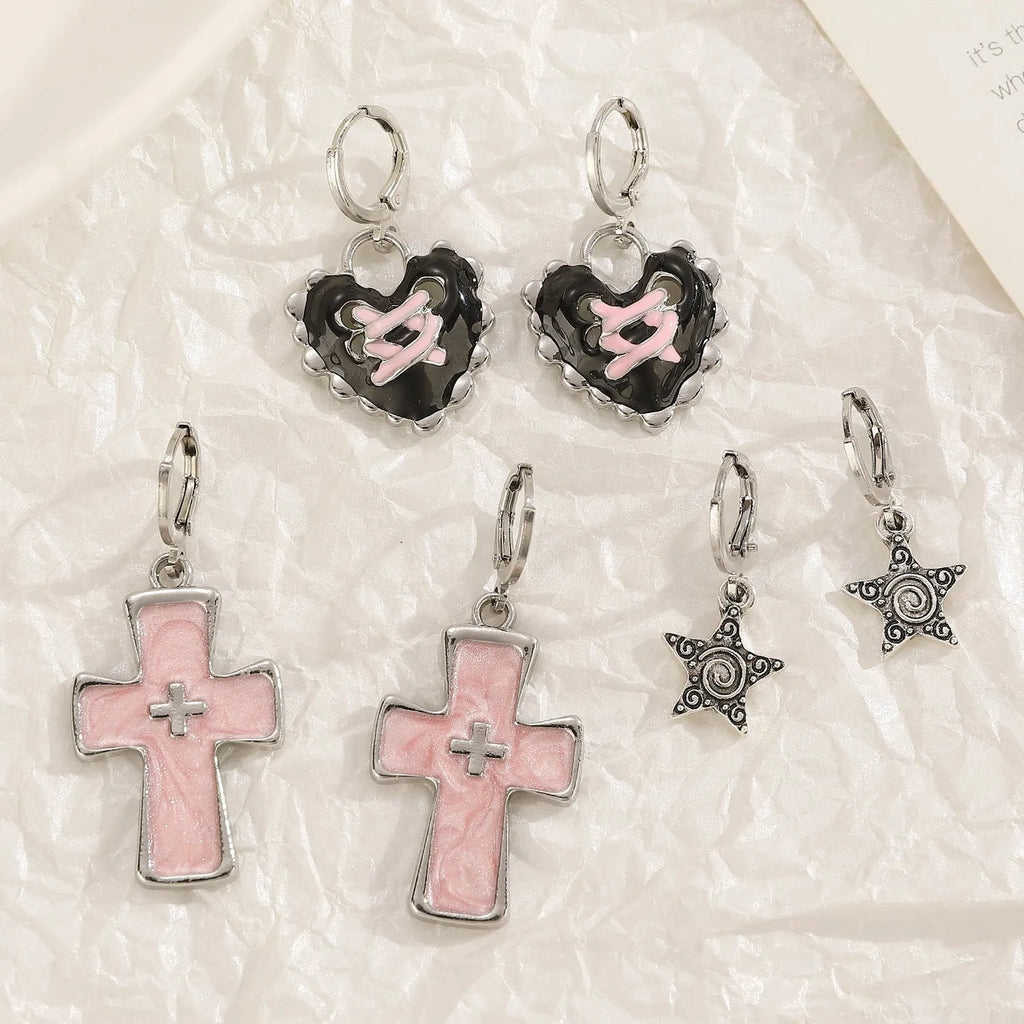 Women's alloy cross crystal earrings in five colour options with cross, heart, and character design elements