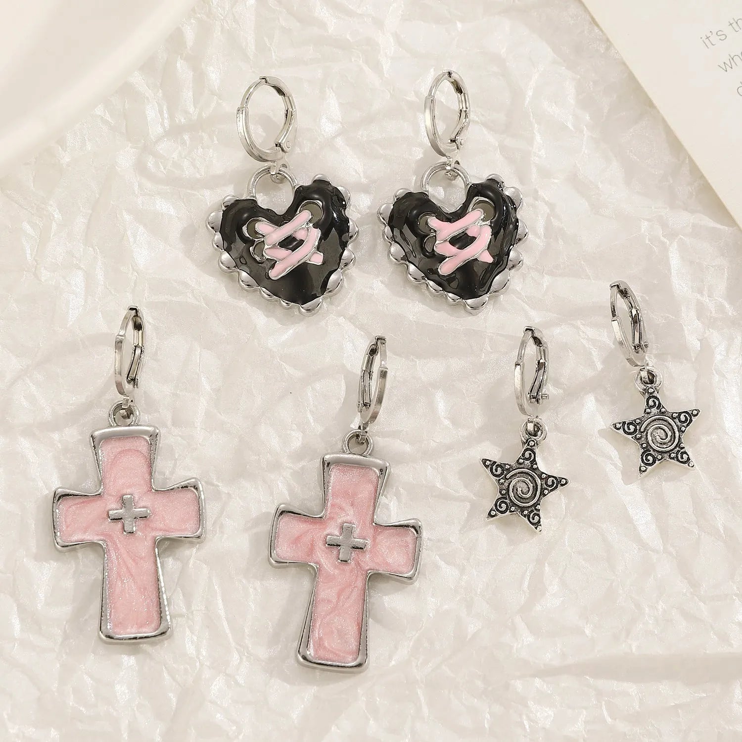 Women's alloy cross crystal earrings in five colour options with cross, heart, and character design elements