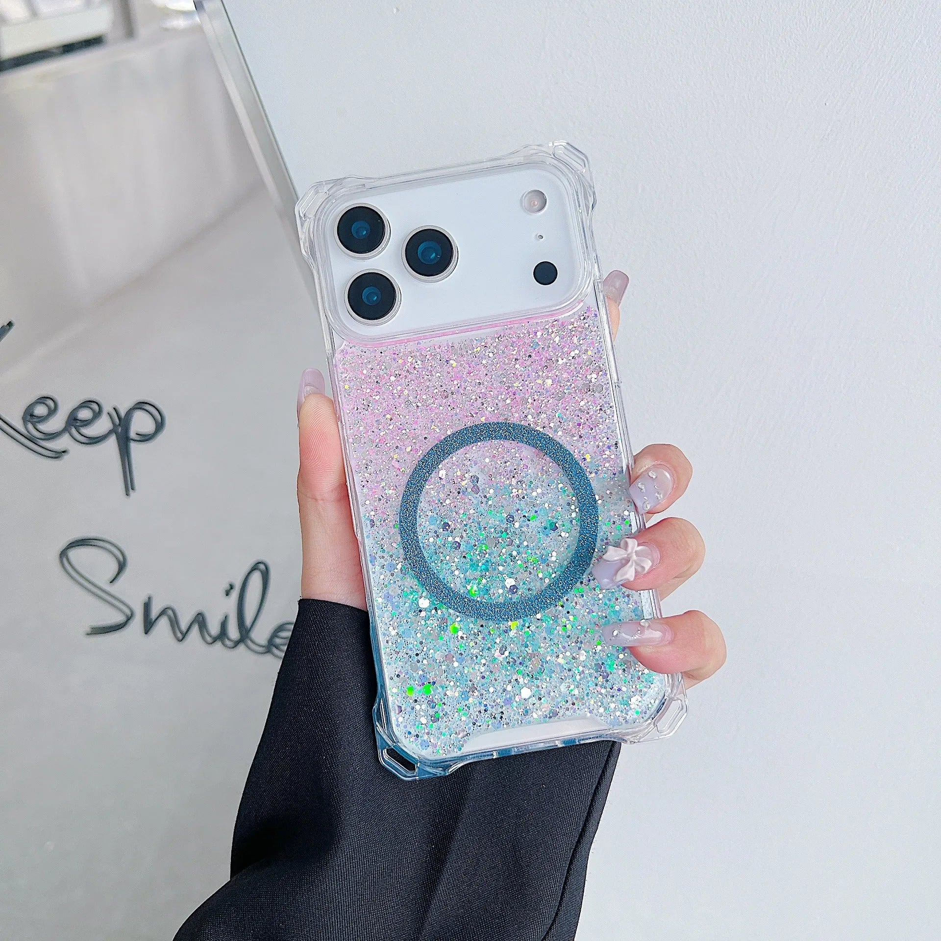 Glitter magnetic drop-resistant TPU phone case for iPhone 16 Pro with frosted finish in pink blue colour option