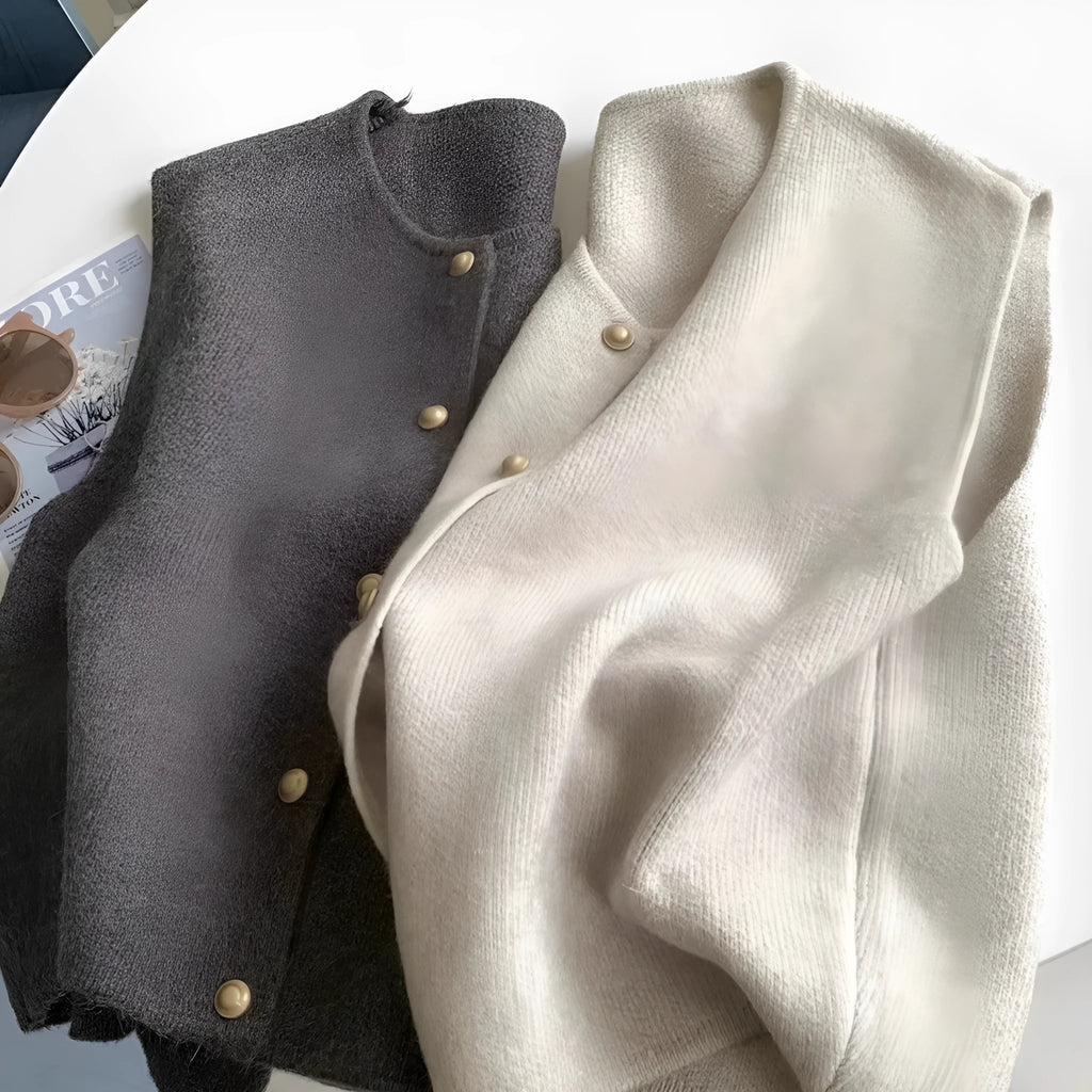 Women's thin polyester pullover vest with half sleeves in a choice of six colours on a hanger.