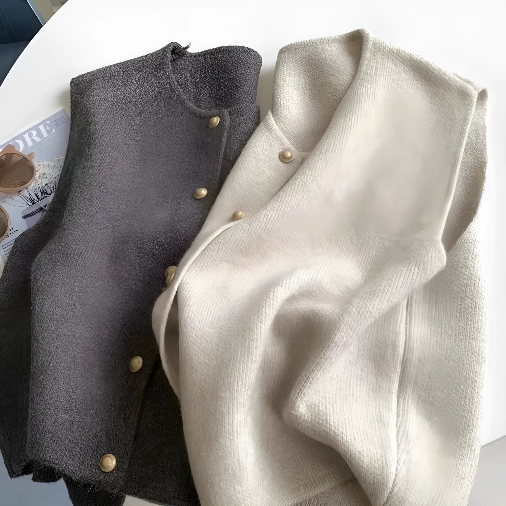 Women's thin polyester pullover vest with half sleeves in a choice of six colours on a hanger.
