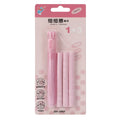 Children's push-type automatic eraser in blue, green, pink, and purple colours measuring 12 by 8 centimetres
