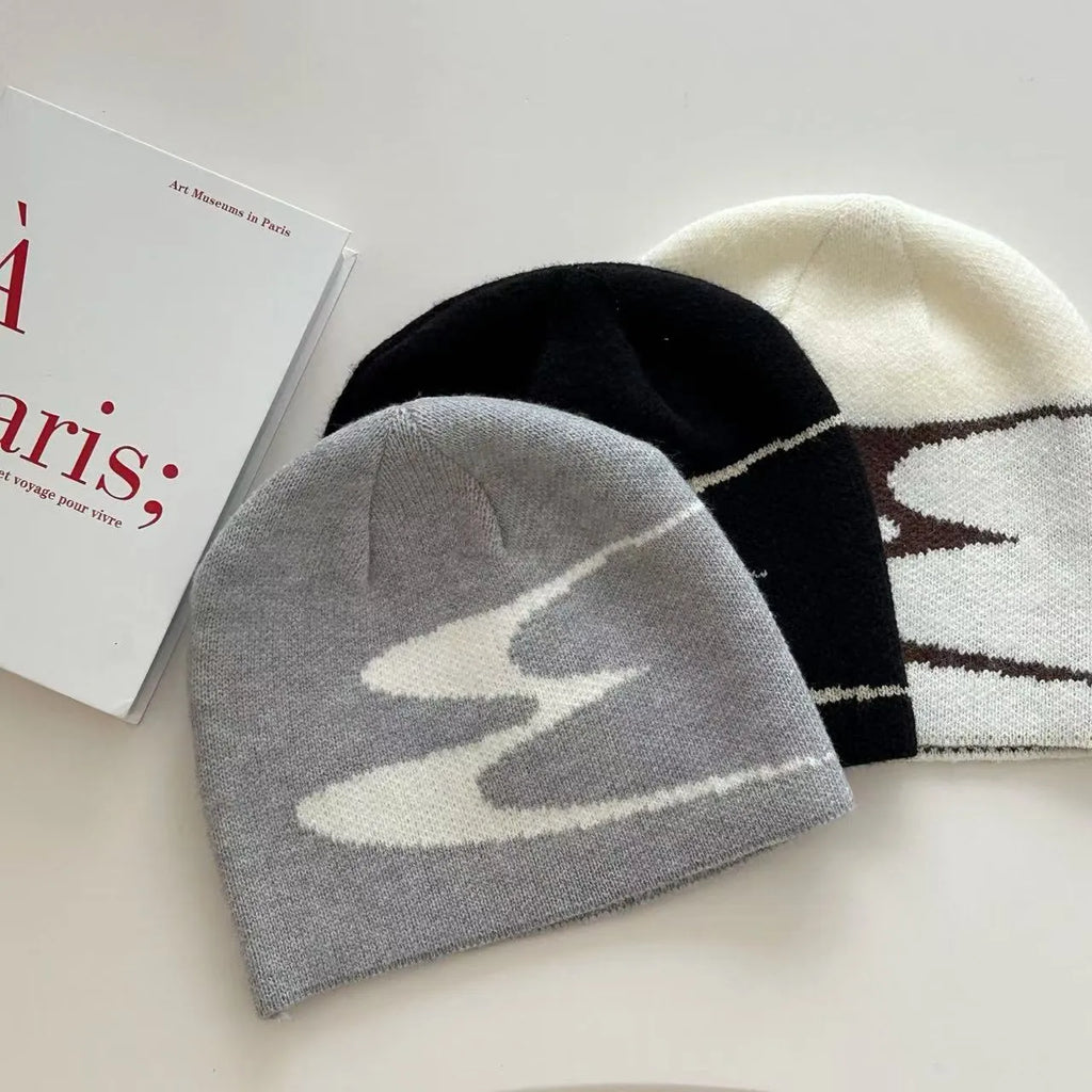 Acrylic knitted beanie hat in black, grey or white colours with 56-58cm head circumference