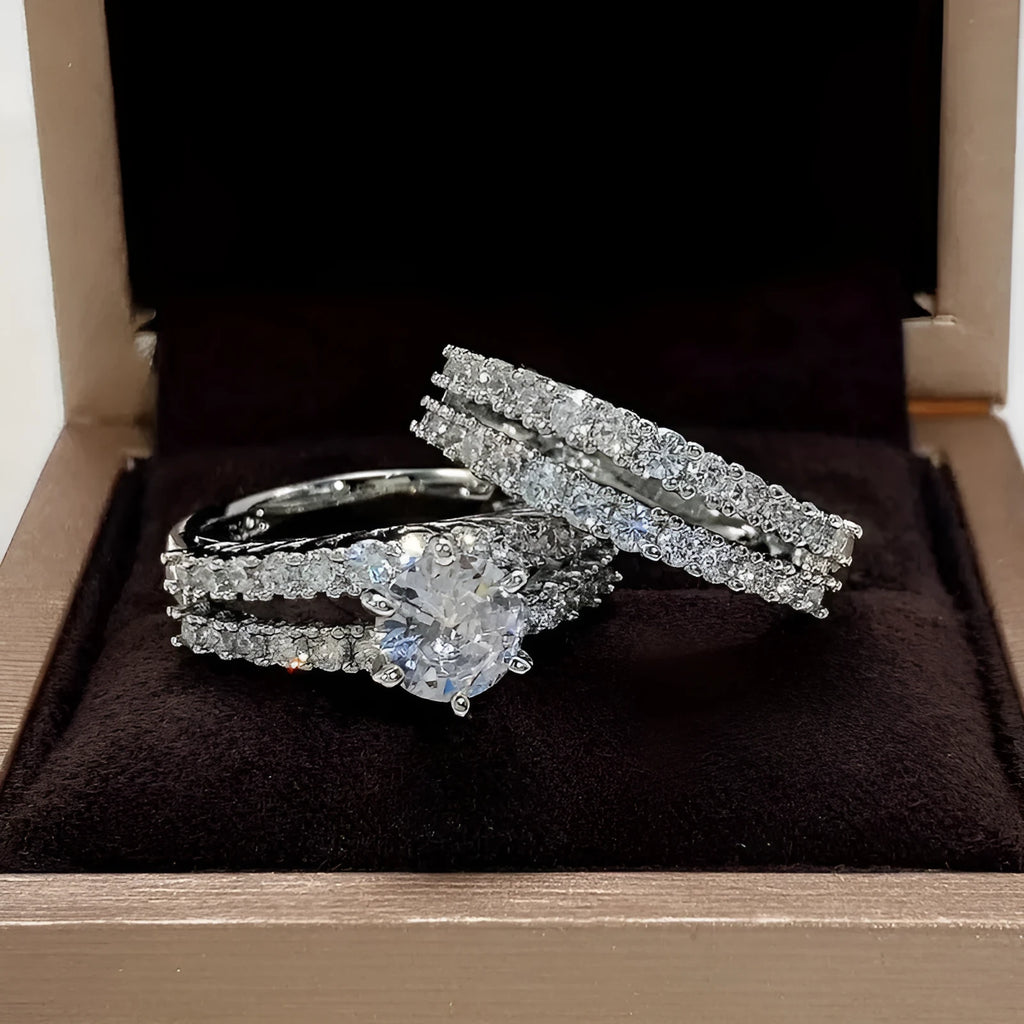 A 2 in 1 set of fully-jewelled geometric rings for women, shown in rose gold, silver, and gold colour options.