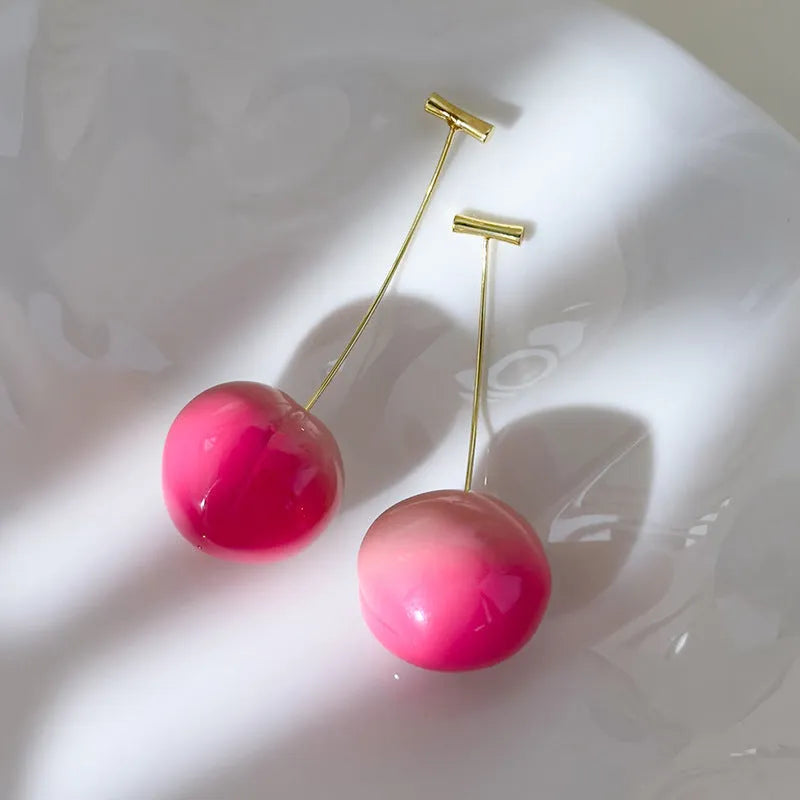 Acrylic juicy peach earrings in small and large sizes with copper hooks