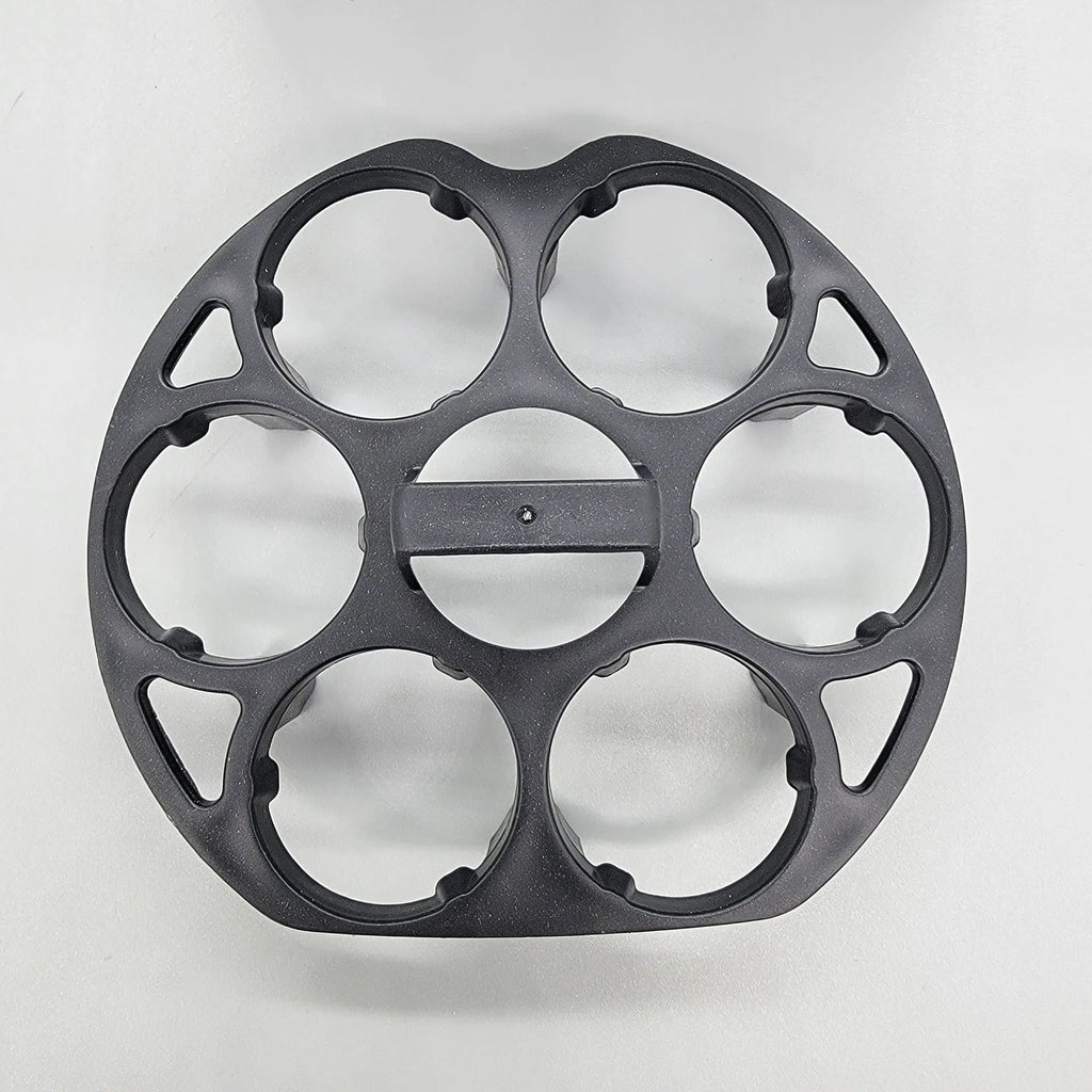 Black plastic egg cooking basket with modern design, shown with dimensions 13.8cm by 12.6cm by 5.7cm.