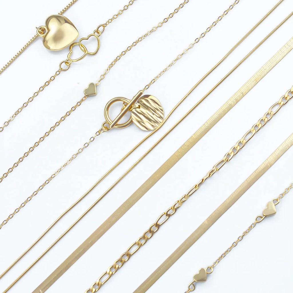 Gold electroplated women's necklace set with snake bones chain and adjustable length jewellery