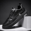 Men's white and black microfiber skate shoes with elastic band fastening and rubber sole