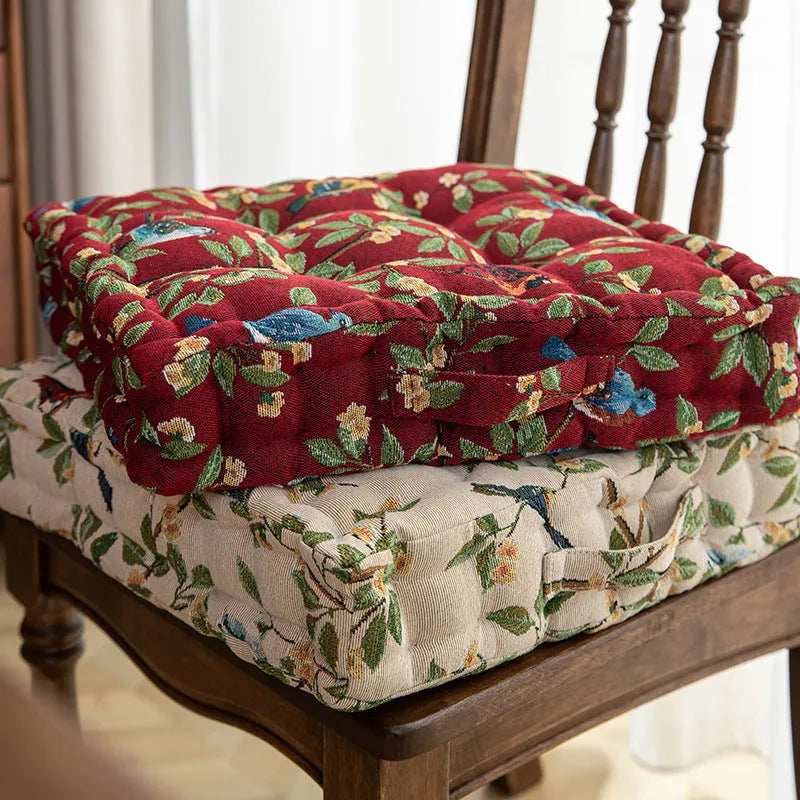American style dining chair cushion in floral apricot pattern with bird motifs measuring 40x40x8cm