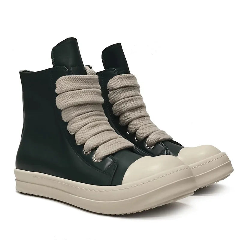 Black high-top leather unisex sneakers with a side zipper on a white background.