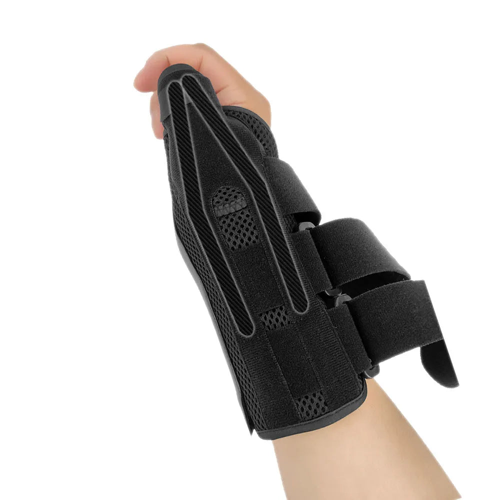 Black carbon fibre sports wrist guard with grey edging and an adjustable thumb strap.