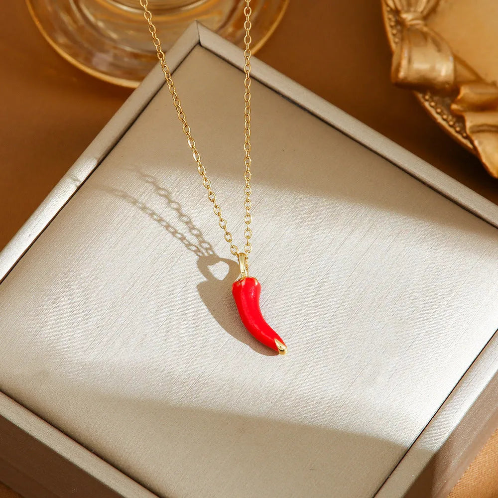 Titanium steel necklace with delicate fruit pendant on O-ring chain, available in golden and steel zircon finishes.