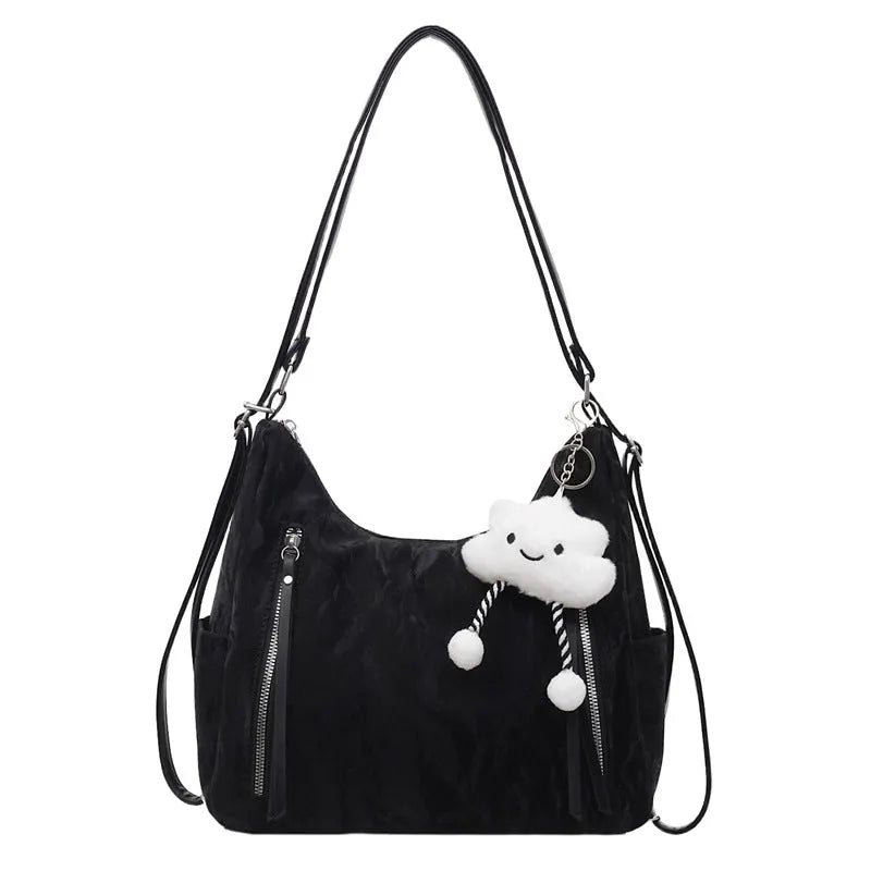 Women's soft PU leather fashion backpack in black colour with pendant accessory