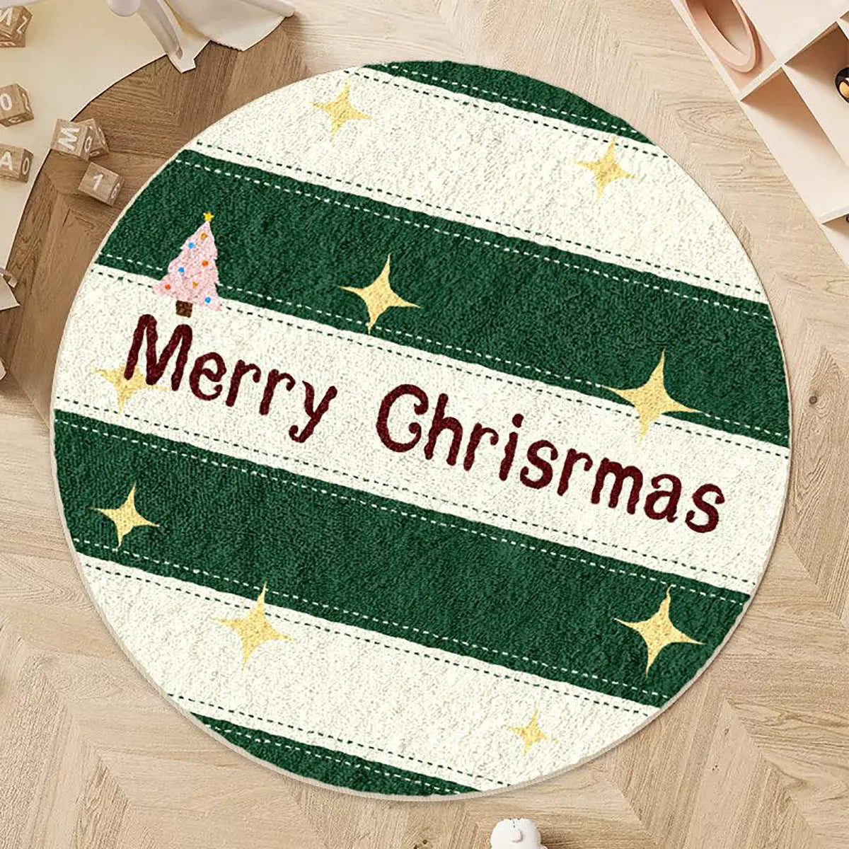 Round alien-shaped Christmas carpet in imitation cashmere, showing one of six festive colour designs.