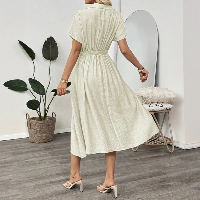 Light green women's shirt dress with lapel collar, waist tie, and side pockets on a model.