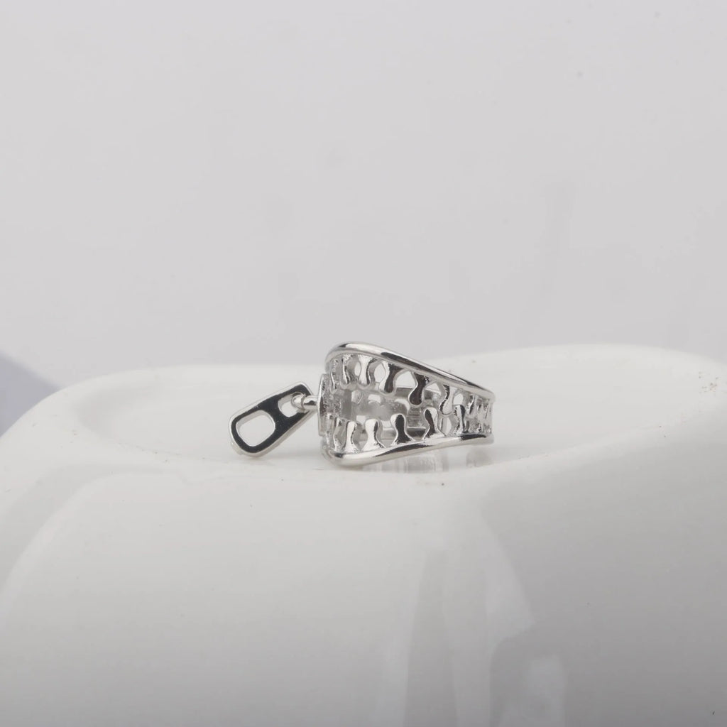 Copper geometric ear bone clip with linear patterns and zipper fastening in ES862 colour