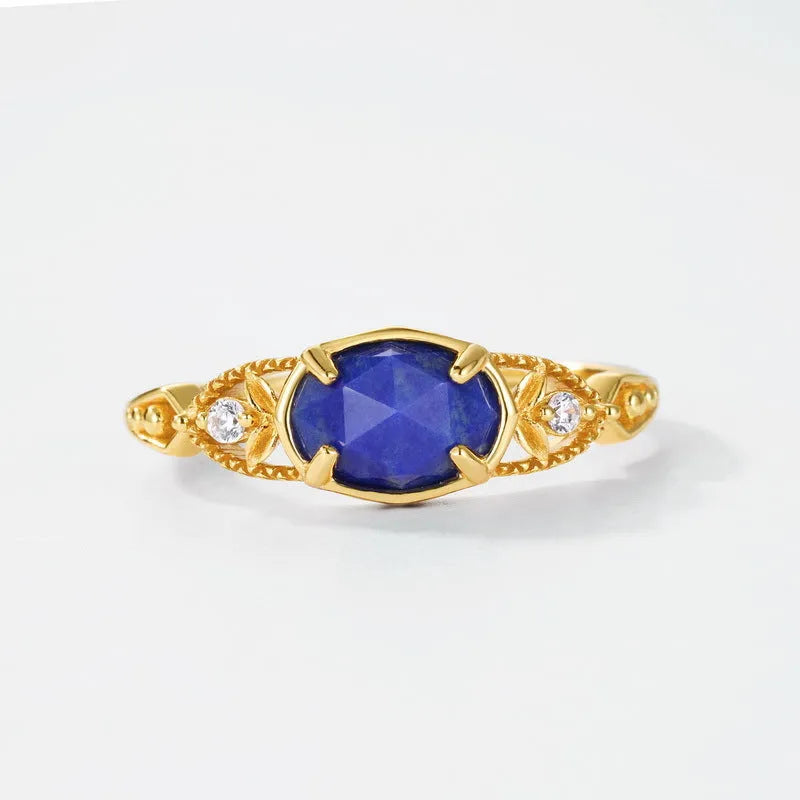 Japanese style silver ring with oval lapis lazuli stone and geometric design