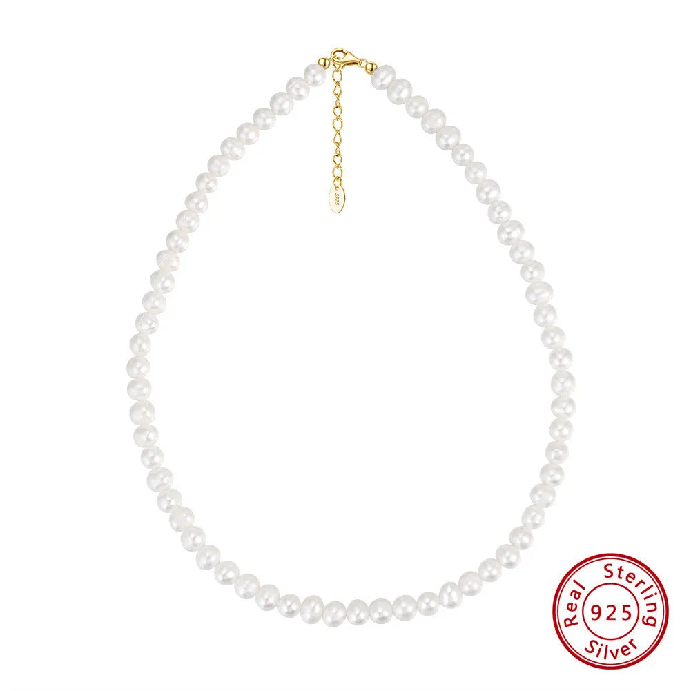 Women's adjustable silver necklace featuring a single round 6-7mm freshwater pearl on a chain.