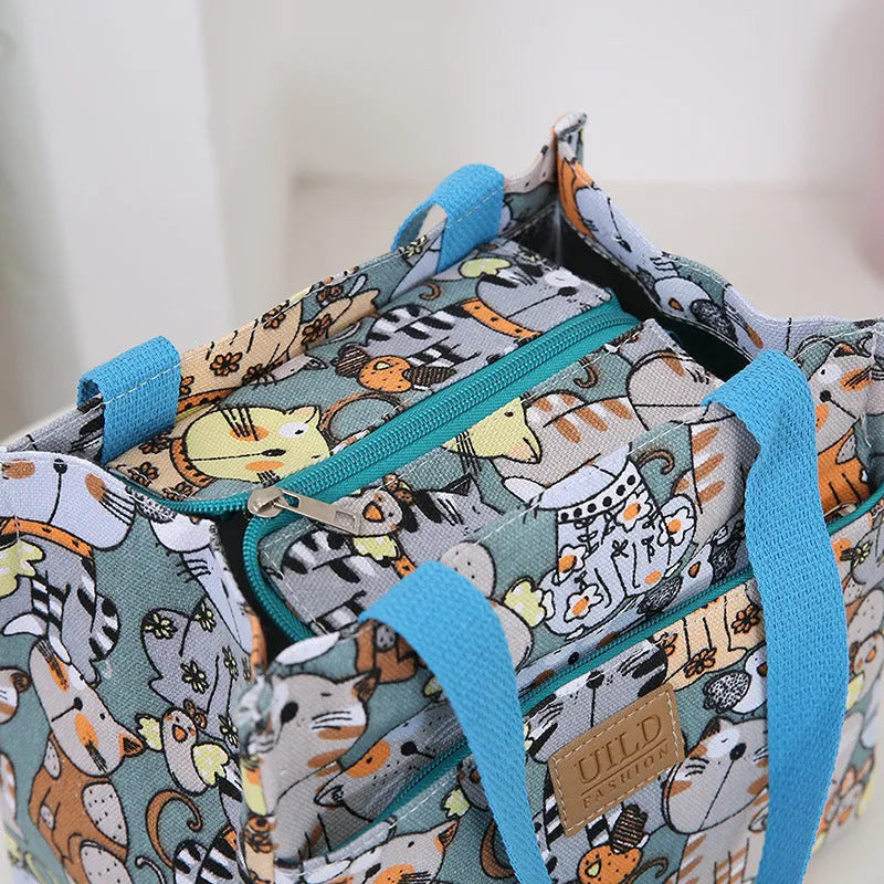 Women's printed canvas handbag with aluminium frame in horizontal square shape showing flower design options