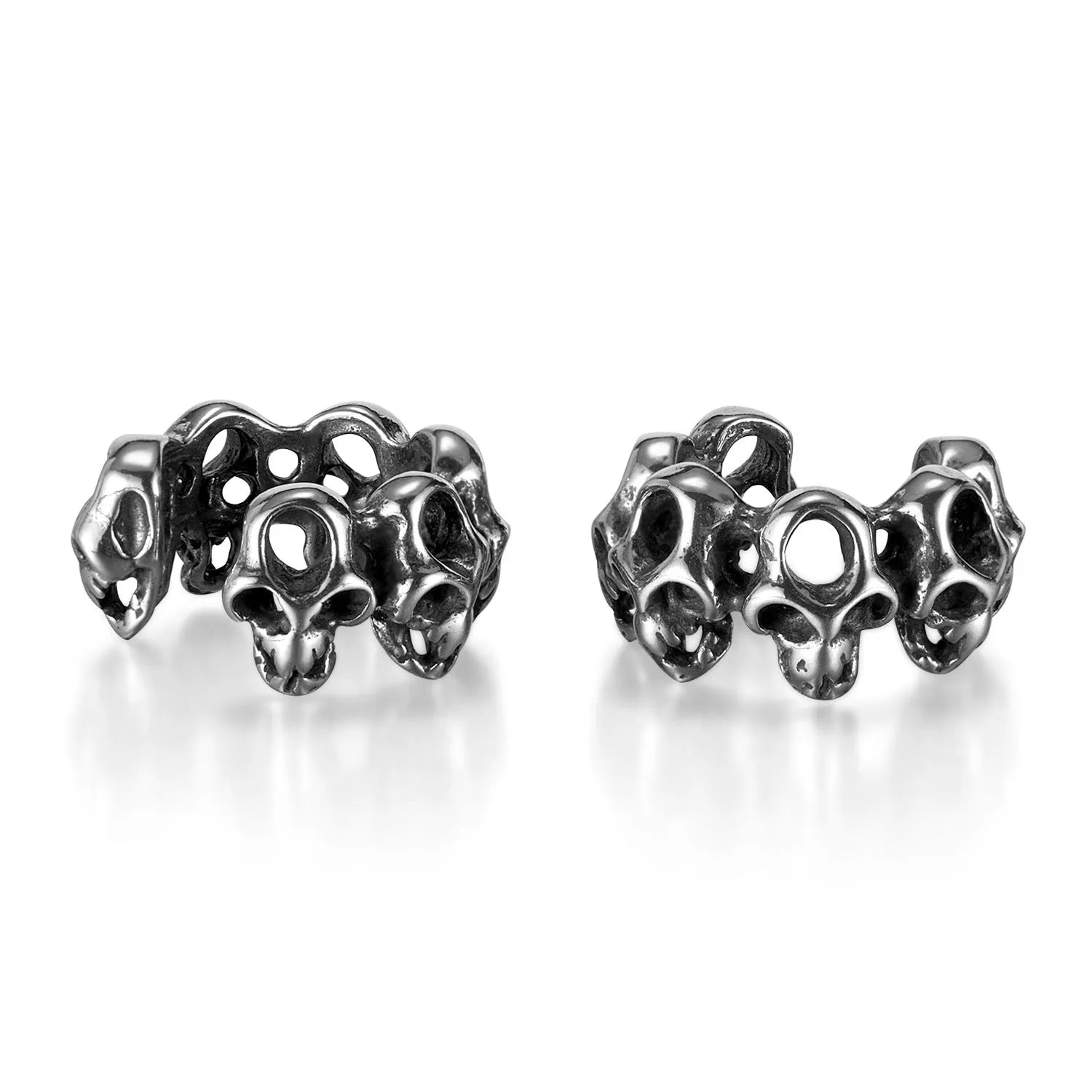 Stainless steel clip-on earrings with a hollow geometric skull design.