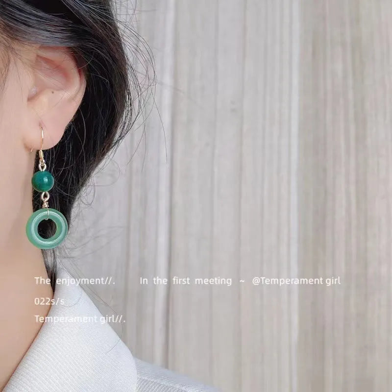 Green geometric peace buckle Chinese-style earrings made from zinc alloy with 14K gold purity plating