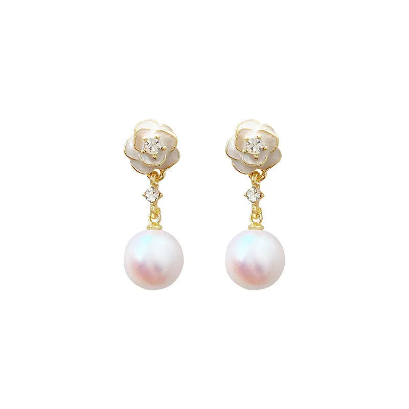 A pair of camellia flower design stud earrings for women in a pearl-white alloy.