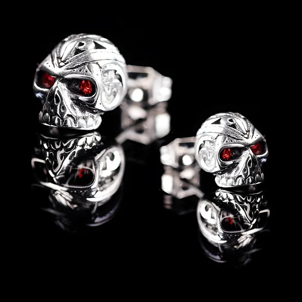 Red eye ghost skull stud earrings with alloy construction and electroplated finish