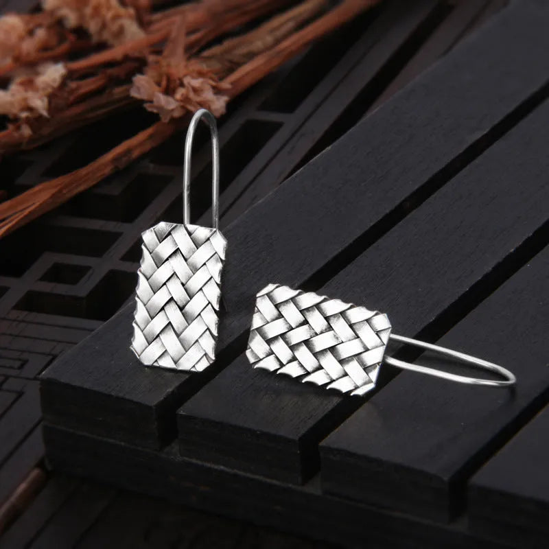 Silver geometric diamond earrings with woven plaid pattern, 17.5mm by 11mm