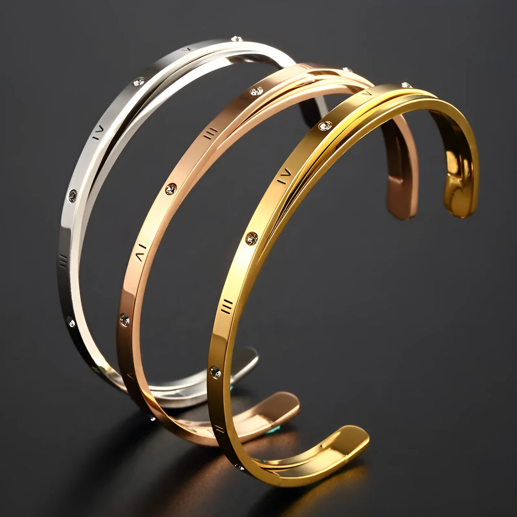 Open-ended stainless steel bracelet with inlaid zircon stones in rose gold colour