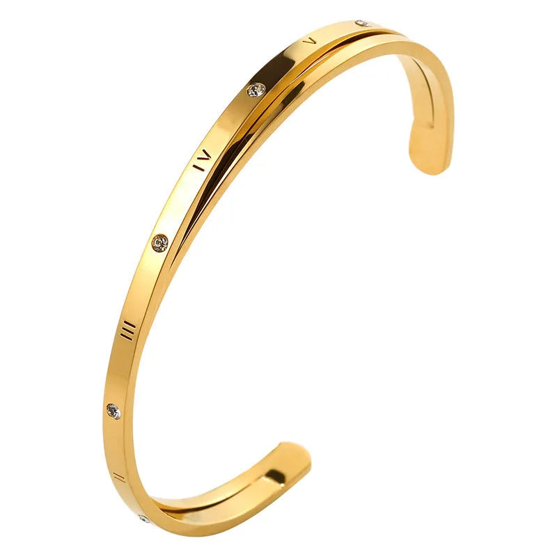 Open-ended stainless steel bracelet with inlaid zircon stones in rose gold colour