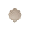 White resin shell-shaped ornament for fruit plate decoration on a table