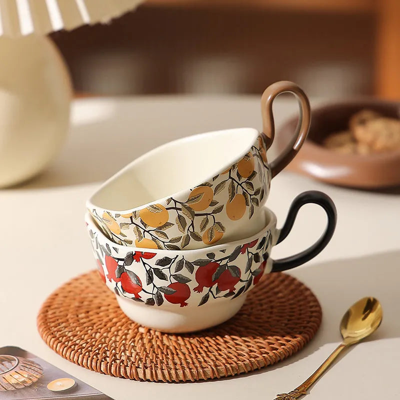 Antique style ceramic coffee cup and saucer set with medieval decoration in black or orange
