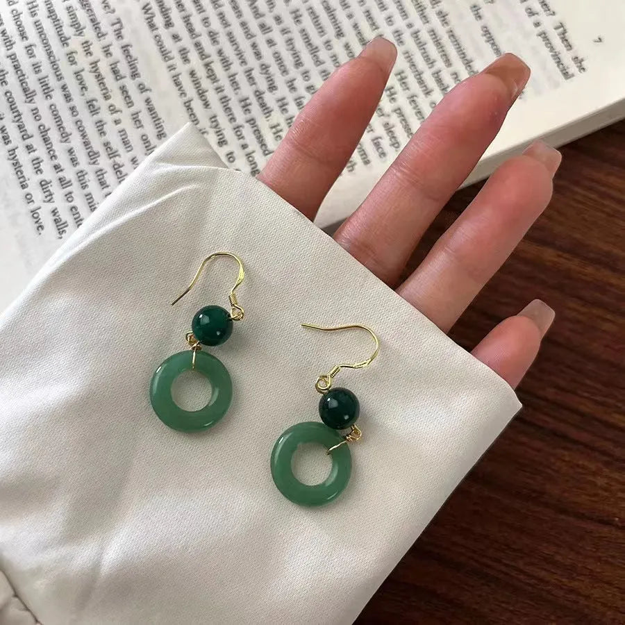 Green geometric peace buckle Chinese-style earrings made from zinc alloy with 14K gold purity plating