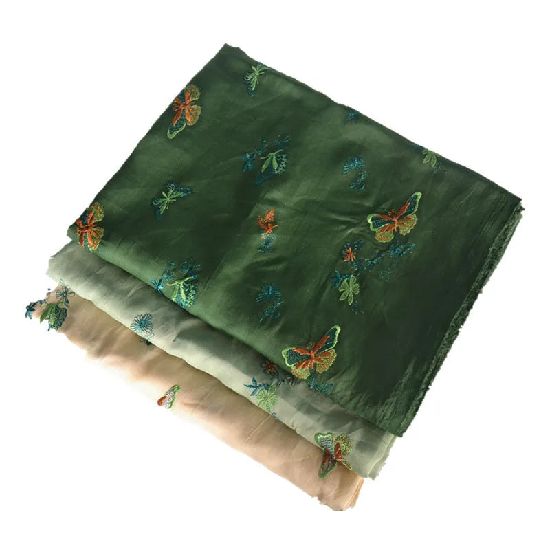 Pure ramie embroidery cloth Hanfu fabric in beige, grass green and dark green colours showing texture