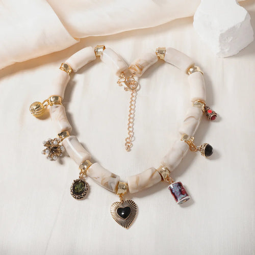 Heart-shaped bamboo resin pendant necklace with electroplated metallic finish