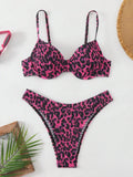 Women's leopard print bikini set with backless top and briefs bottom in brown and red colour options.
