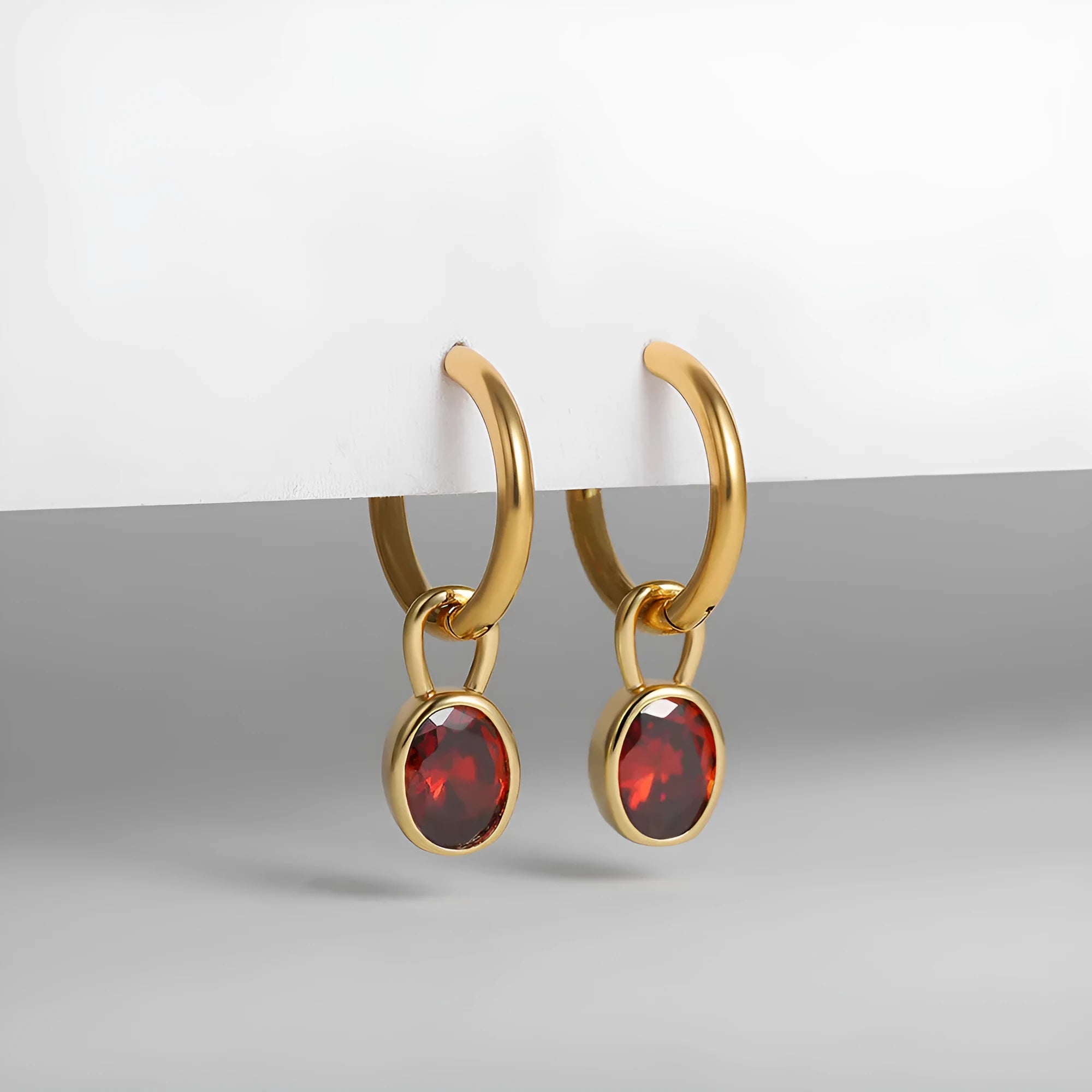 Women's copper retro oval zircon earrings in six colour options showing elliptical design