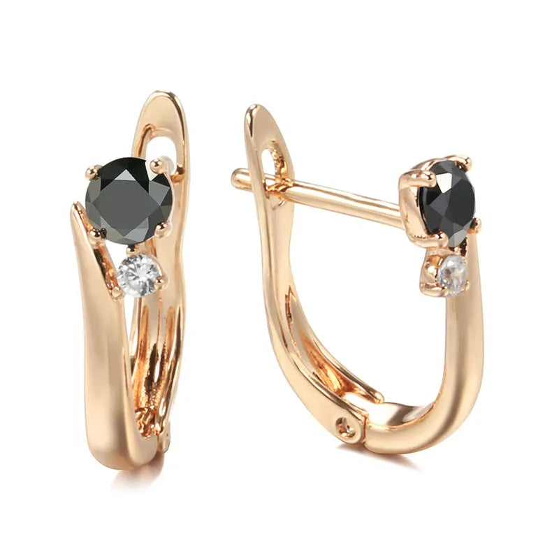 Gold geometric drop earrings with black agate inlay on copper