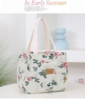 Women's printed canvas handbag with aluminium frame in horizontal square shape showing flower design options