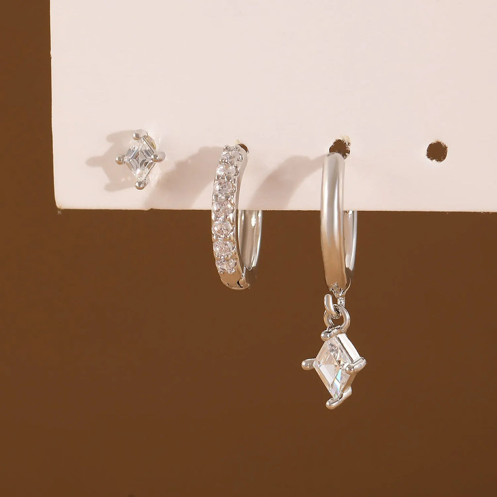 Geometric pattern copper earring set with zircon stones in clip, stud, and dangle styles