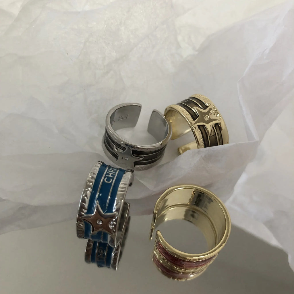 Adjustable copper ring with distressed finish and geometric drop oil design