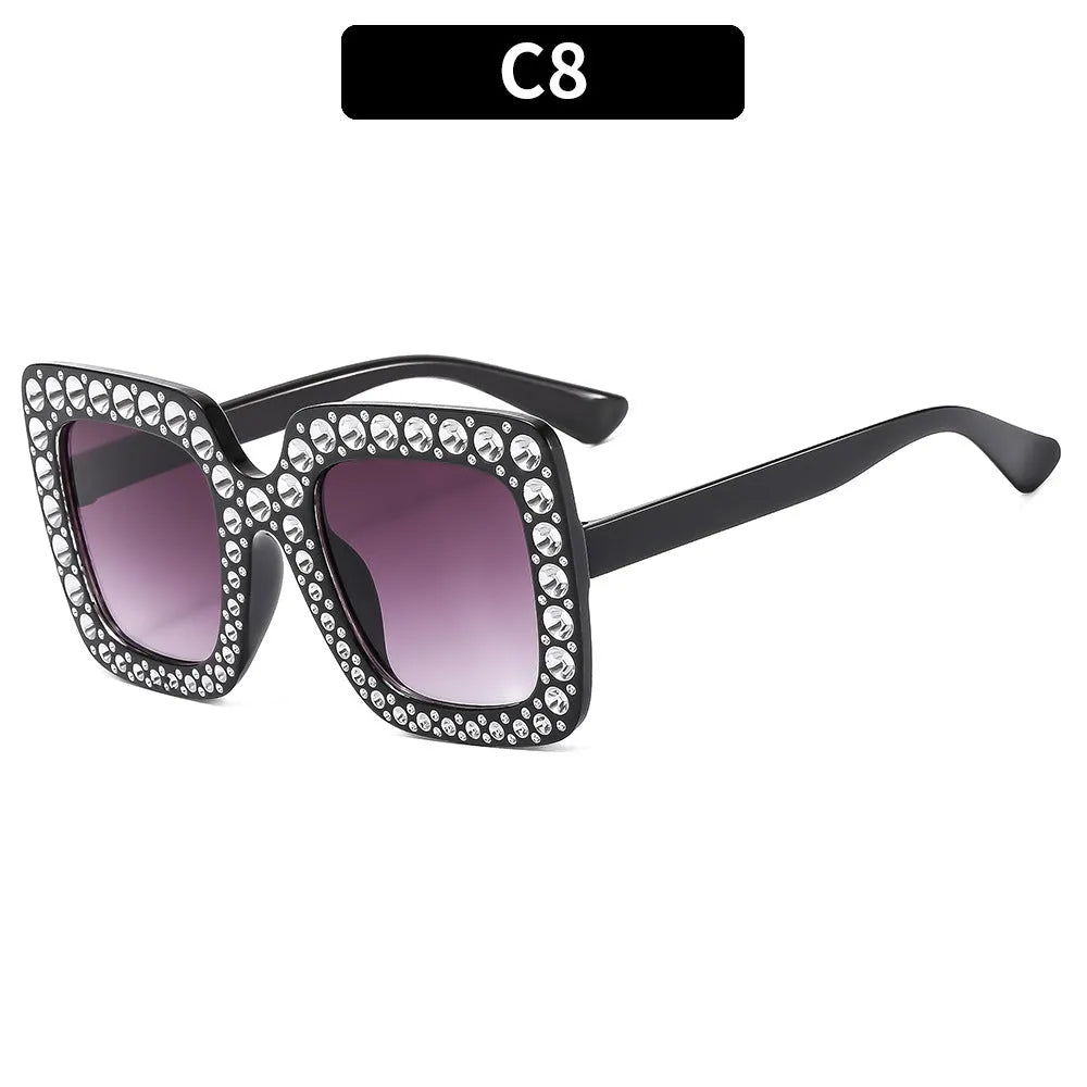 Plastic fashion sunglasses in multiple colour options including black, pink, and transparent frames