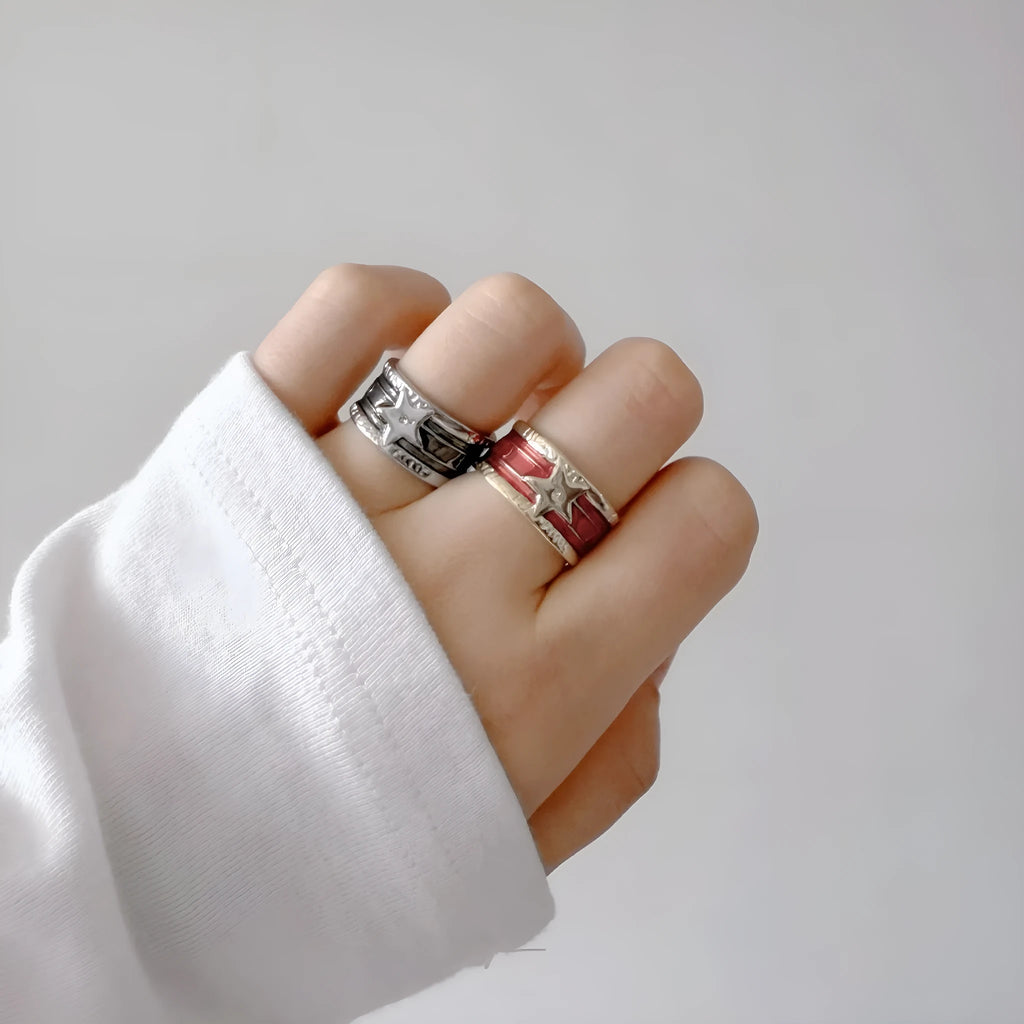 Adjustable copper ring with distressed finish and geometric drop oil design