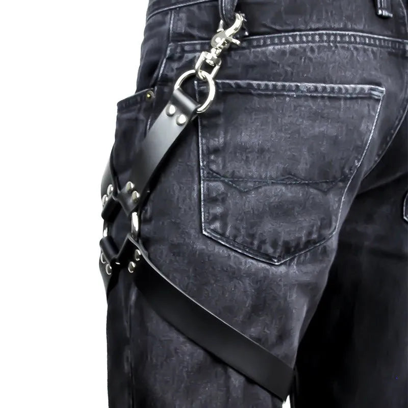 Black PU leather leggings with leather accessories attached to the legs