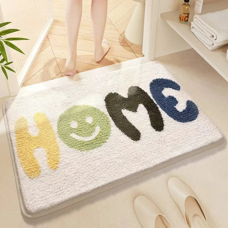Square rainbow print carpet mat in Sky Sea colour with a plastic anti-slip bottom, shown in two sizes.