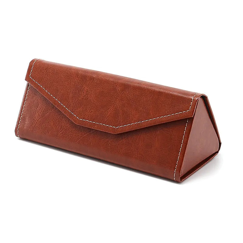 Triangular folding glasses case in various colours showing folded and open positions